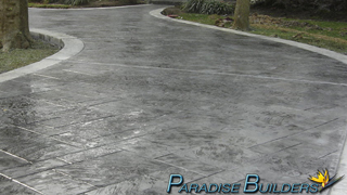 Stamped concrete driveway with dark grey and light grey accents