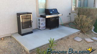 Concrete slab for bbq and smoker in a las vegas backyard