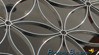 Artistic metalwork that is chrome plated in a symmetrical pattern