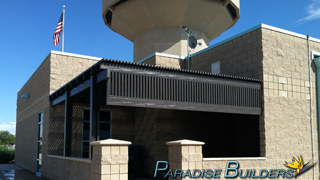 Brown lattice patio cover installed at the north las vegas airport control tower